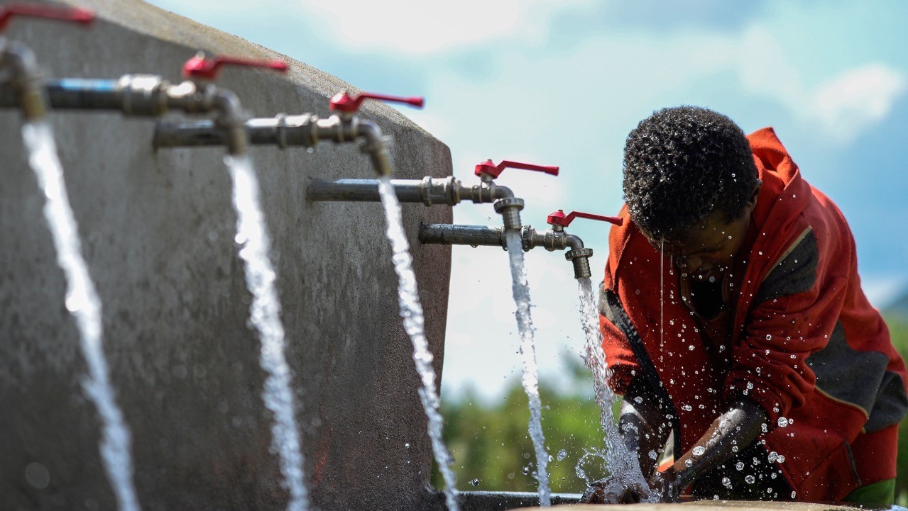 child enjoying clean water